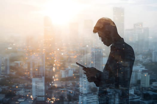 Double exposure of business and a city - Asian businessman using a digital tablet superimposed on a city skyline. Neural network generated image. Not based on any actual person or scene.
