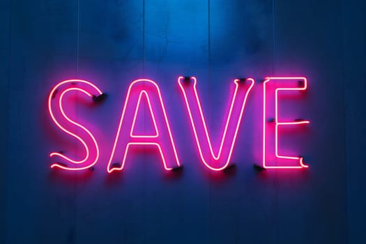 Neon word save on dark shabby wall. Neural network generated image. Not based on any actual scene or pattern.