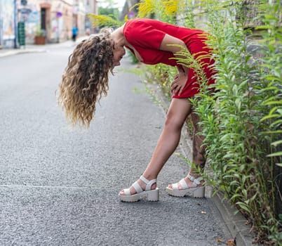 happy young woman with blowing hairs