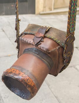 Rudimentary leather case for reflex camera. View hanging from its straps