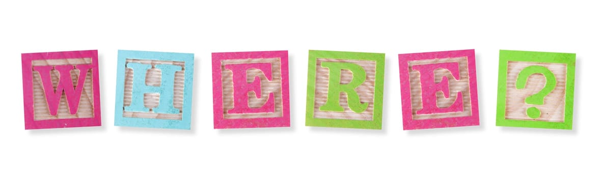 A Where concept with childs wood blocks on white with clipping path to remove shadow
