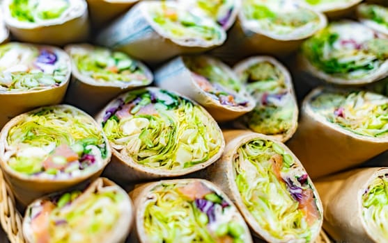 Freshly prepared tortilla wraps sold in a fast food restaurant.