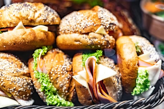 Freshly prepared sandwiches sold in a fast food restaurant.