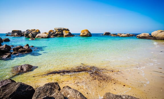 Rocky beach and clear sea in the coast of Kerlouan, Bretagne, France