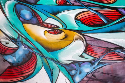 Detail of graffiti painted on public wall, abstract background