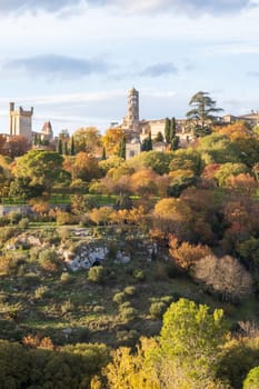 Uzès city of Art and History, vertical view in autumn. His 11th Century Tour Fenestrelle or Window Tower of the Cathedral of Saint Theodorit. Photography taken in Gard, France