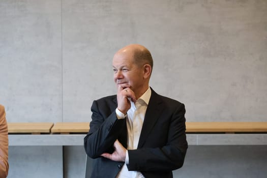 Federal Chancellor Olaf Scholz during a visit to the Europa Park Stadium in Freiburg with the participants in the dialogue with socially engaged citizens from Freiburg and the surrounding area in the Business Lounge on the ground floor of the main grandstand