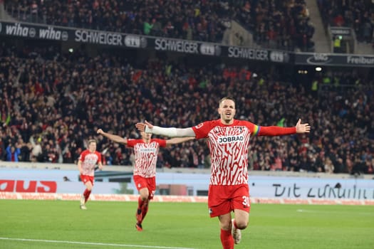 Christian Günter (SC Freiburg) scores to make it 1-0 and celebrates his first goal of the season in the match of the 1. FBL: 23-24: 24. Sptg. SC Freiburg - FC Bayern Munich  DFL REGULATIONS PROHIBIT ANY USE OF PHOTOGRAPHS AS IMAGE SEQUENCES AND/OR QUASI-VIDEONann  Photo: Joachim Hahne/johapress