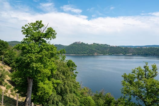 View of the Lake Eder, with a view of a castle, with blue sky and clouds, Hesse, Germany