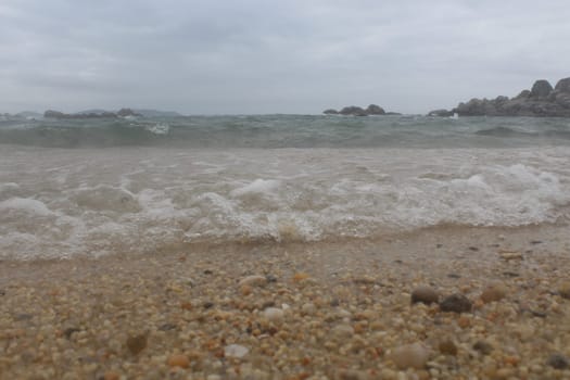 sea currents sand beach stones cliffs waves summer vacation