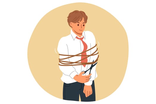 Successful business man freed himself from ropes limit movements and prevent from achieving success. Guy manager is freed from shackles hinder professional growth and career advancement