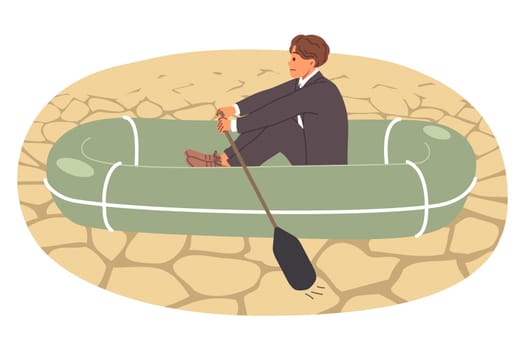 Business man sails through desert on inflatable boat, showing unprofessionalism and lack of skill in handling crisis situations. Concept of crisis disrupting entrepreneur plans to achieve success