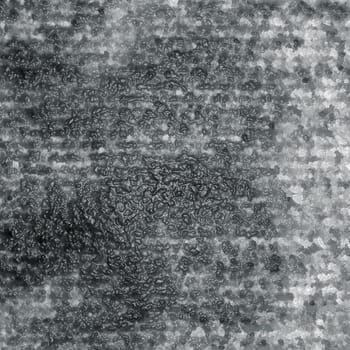 Glossy mottled rough relief gray background close-up
