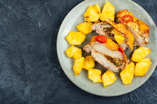 Exotically barbecue, meat roasted with fresh pineapple