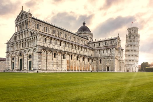 Pisa, Italy - 29 June 2023: cathedral sightseeing, travel destination, sunrise light, famous artistic building