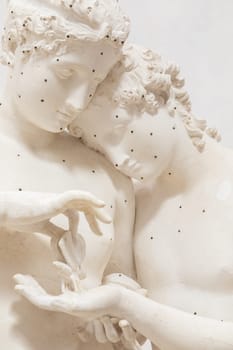 Possagno, Italy - 29 June 2023: Cupid and Psyche statue by sculptor Antonio Canova, 1800. Sensual hug, love and togetherness emotion.