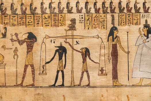 Turin, Italy - February 2023: Egyptian Museum. Detail of the Book of the Dead with funerary formulas and spells, papyrus, 330 BC