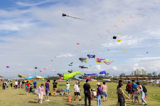 Hsinchu, Taiwan 10 September 2023: Many beautiful kite fly over the sky in Hsinchu city international kite festival at park