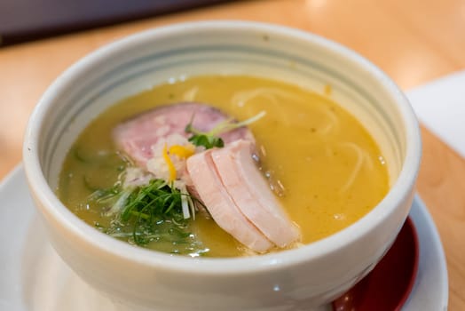 Bowl of Japanese ramen in restaurant