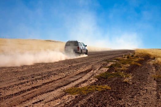 Vehicle on a rough desert road in the Namib Desert in Namib-Nuakluft National Park in Namibia