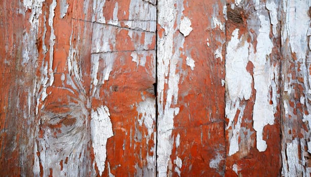 Light blue red and green weathered wooden background with cracked paint.