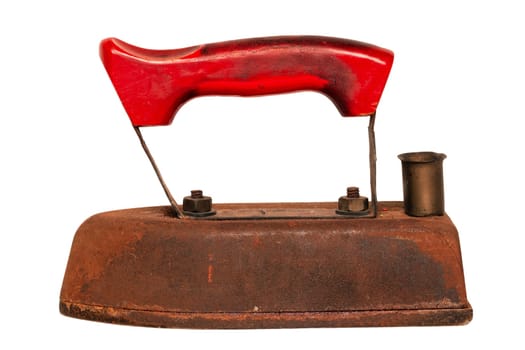 Vintage Iron isolated. Antique professional old rusty electric tailor iron with a red wooden handle with Clipping path isolated on white. Tailoring accessories. Macro.