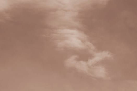 A gentle soft cloudscape in Peach Fuzz