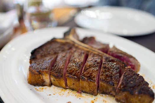 Sliced of grilled steak rib eye medium rare status