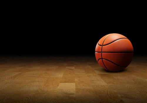 Basketball on a hardwood court floor