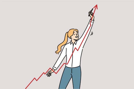 Business woman draws growing graph showing company profit growth from attracting new customers. Girl financial analyst predicts growth of business indicators thanks to quality management
