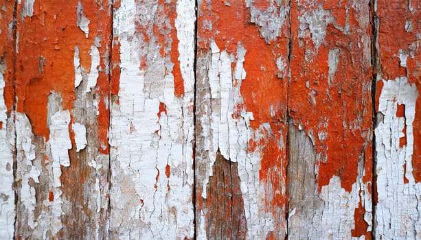 Light blue red and green weathered wooden background with cracked paint.
