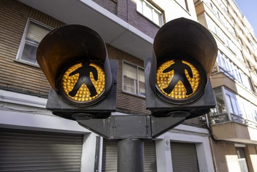 Detail of road sign to cross a road for pedestrians