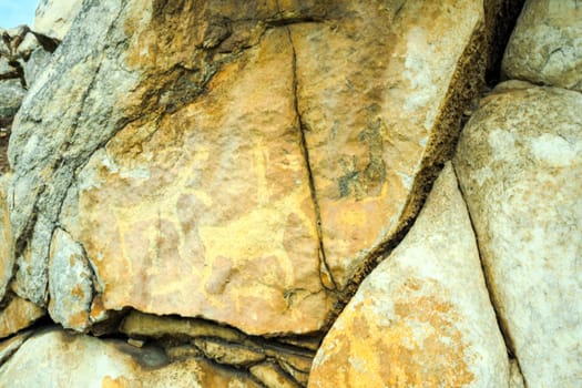 Rock paintings on stones, rocks with pictures on Baikal. Rock paintings on stones, rocks with pictures on Baikal.