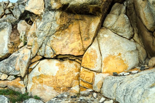 Rock paintings on stones, rocks with pictures on Baikal. Rock paintings on stones, rocks with pictures on Baikal.