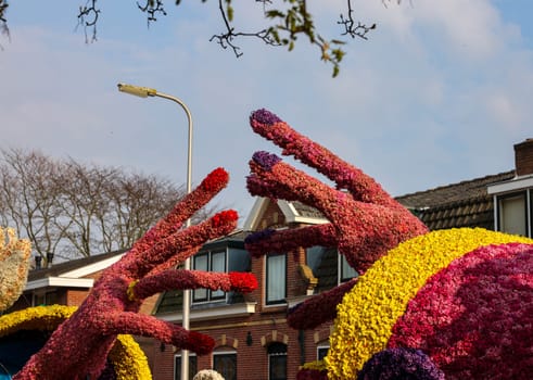 Noordwijkerhout, Netherlands - April 21, 2023: Hand made of tulips and hyacinths presented before the evening illuminated Flower Parade Bollenstreek in Noordwijkerhout
