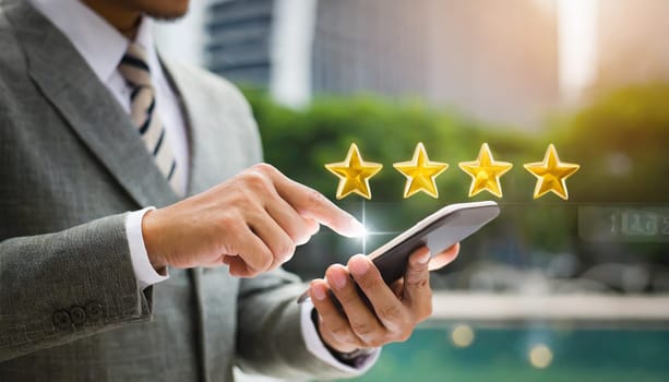 close up on customer man hand pressing on smartphone screen with gold five star rating feedback icon and press level three rank (good) for give score point to review the service business concept