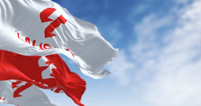 Madrid, SP, mar 6 2024: Three La Liga flags waving on a clear day. Top professional football division of the Spanish football league system. Illustrative editorial 3d illustration render