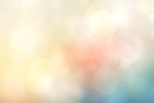 Abstract blurred vivid spring summer light delicate pastel blue orange yellow bokeh background texture with bright soft color circles. Card concept. Beautiful backdrop illustration.