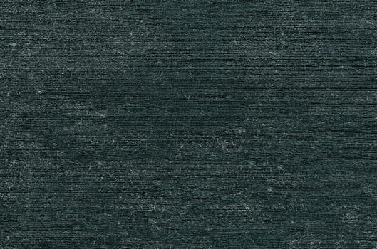 Background texture of a dark gray uneven background with horizontal stripes and light spots
