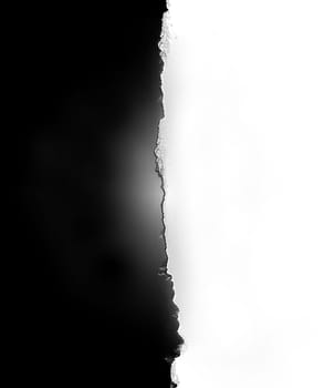 Background texture black and white split surface with uneven edges close-up view from above