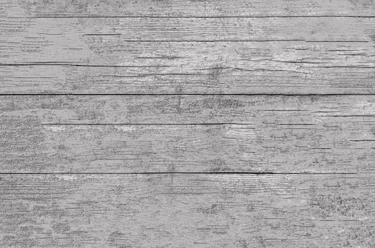 The wall surface imitating old rough boards with a natural pattern on the surface