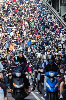 Taipei, Taiwan 19 April 2023: Crowd of motorcycles over the Taipei bridge
