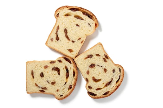 Indulge in the comforting taste of home with a trio of tender raisin bread slices, each showcasing plump raisins and a golden crust. It captures the essence of homemade goodness, promising warmth and nostalgia in every bite