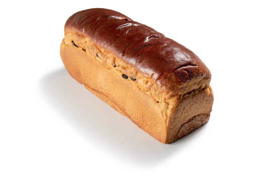 Savor the simple joy with a classic raisin bread, baked to perfection with plump raisins nestled within. This comforting image evokes memories of home, tradition and nostalgia in every slice.