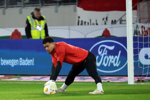 Goalkeeper Noah Atubolu (SC Freiburg) during the warm-up for the match of the 1st FBL: 23-24: 24. Sptg. SC Freiburg - FC Bayern Munich  DFL REGULATIONS PROHIBIT ANY USE OF PHOTOGRAPHS AS IMAGE SEQUENCES AND/OR QUASI-VIDEONann  Photo: Joachim Hahne/johapress