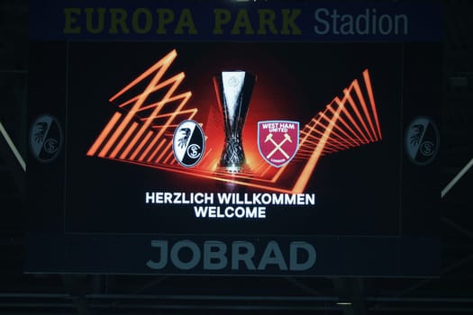 Welcome,welcome is written on the big scoreboard before the match of the Football Europa League - Round of 16: SC Freiburg vs West Ham United