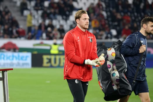 Let's go to the warm-up: Goalkeeper Florian Müller (SC Freiburg) and goalkeeping coach Michael Müller (SC Freiburg)  at the match of the 1st FBL: 23-24: 24. Sptg. SC Freiburg - FC Bayern Munich  DFL REGULATIONS PROHIBIT ANY USE OF PHOTOGRAPHS AS IMAGE SEQUENCES AND/OR QUASI-VIDEONann  Photo: Joachim Hahne/johapress