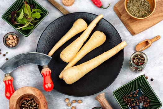 Raw and uncooked parsnips roots. Concept of healthy eating.