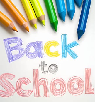 Naive children's drawing with colored chalk on white paper, made by hand by a child, text Back to School. Neural network generated image. Not based on any actual scene or pattern.