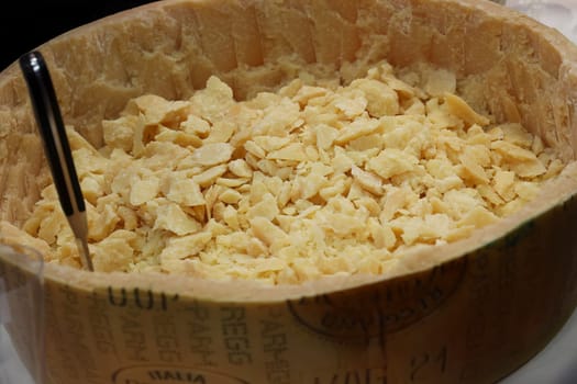 Wheel of Parmesan Cheese ready for tasting